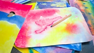 Bright and colorful watercolor with a colored pencil on top
